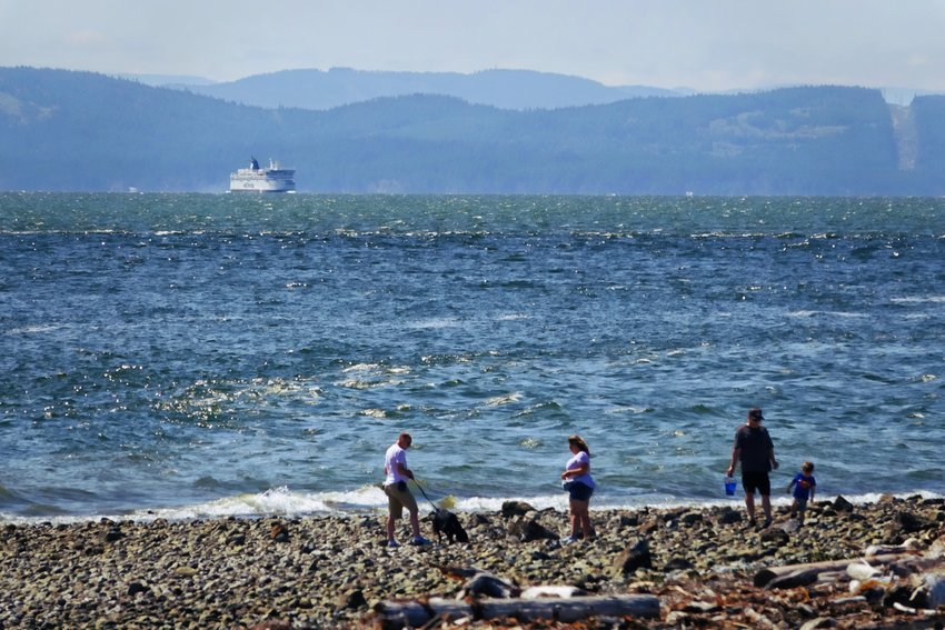 Beach combers and BC Ferry. Photo by Rick Lawler.